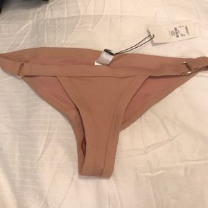 Cute, unworn cheeky bathing suit bottom